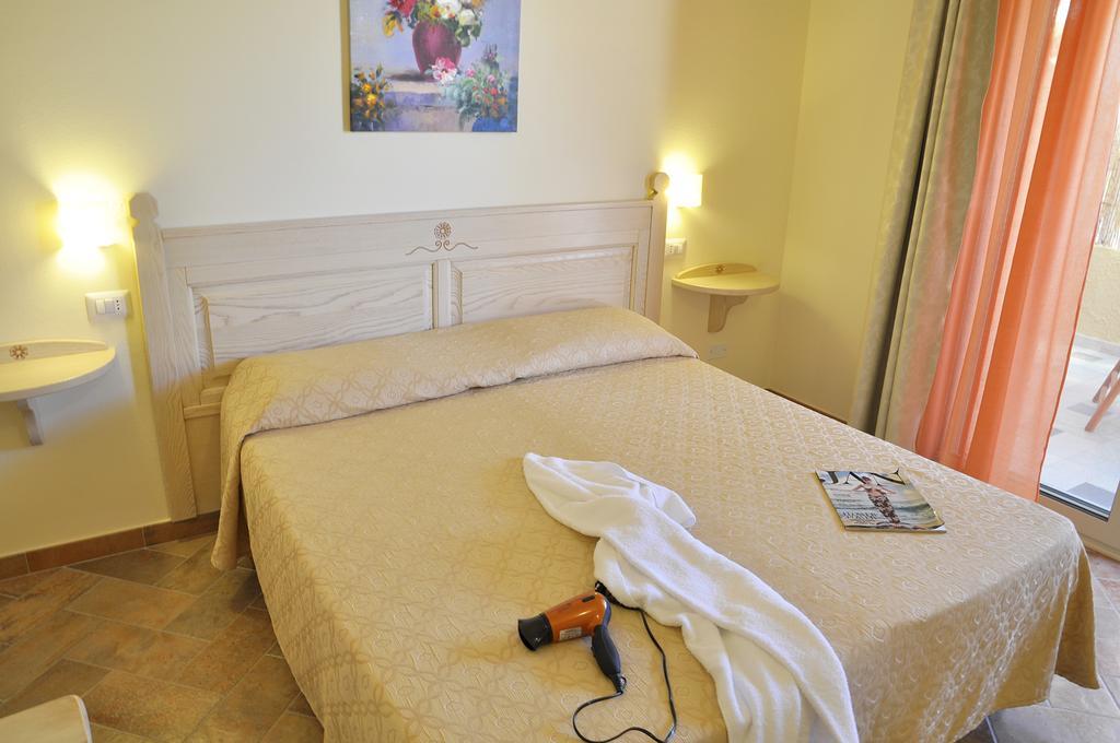 Affittacamere B&B La Villa Dei Graniti Виласимиус Стая снимка