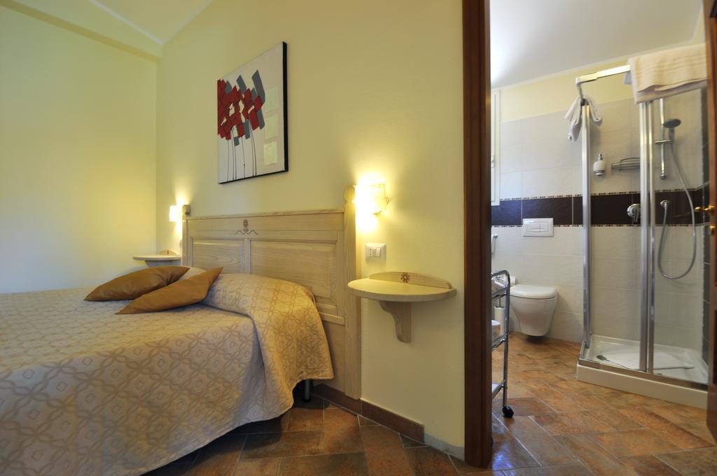 Affittacamere B&B La Villa Dei Graniti Виласимиус Стая снимка